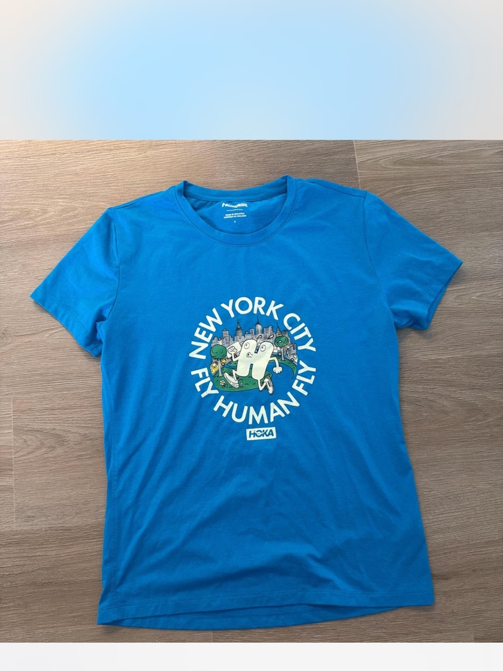 Hoka Blue New York City Graphic Tee